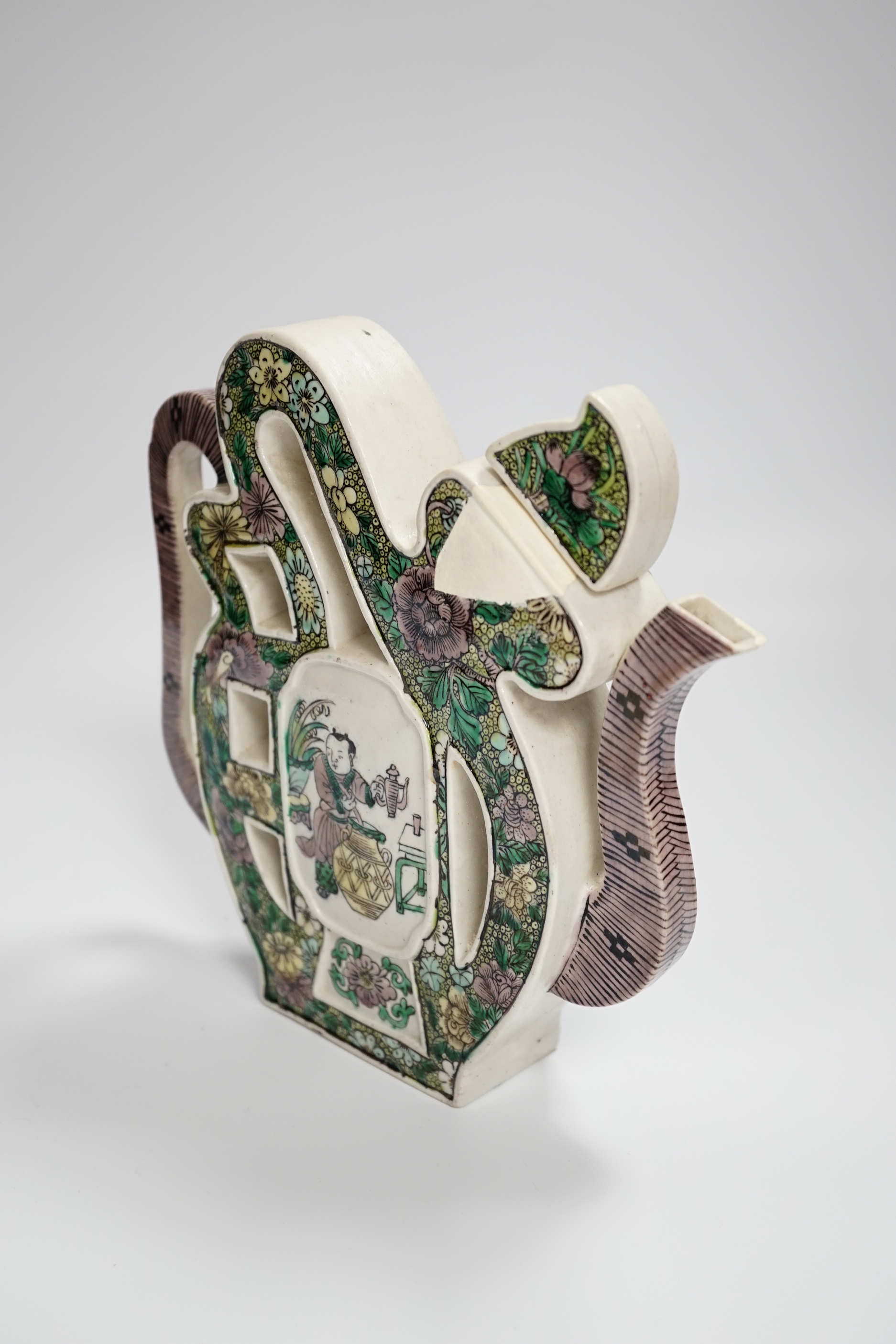 A 19th century Chinese puzzle wine pot, 19cm high